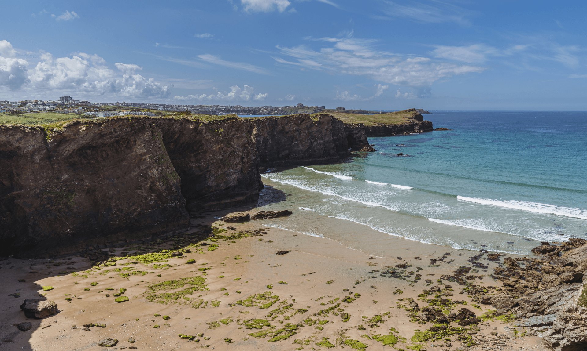 The Newquay coastline looking along towards Porth and Whipsiderry beaches