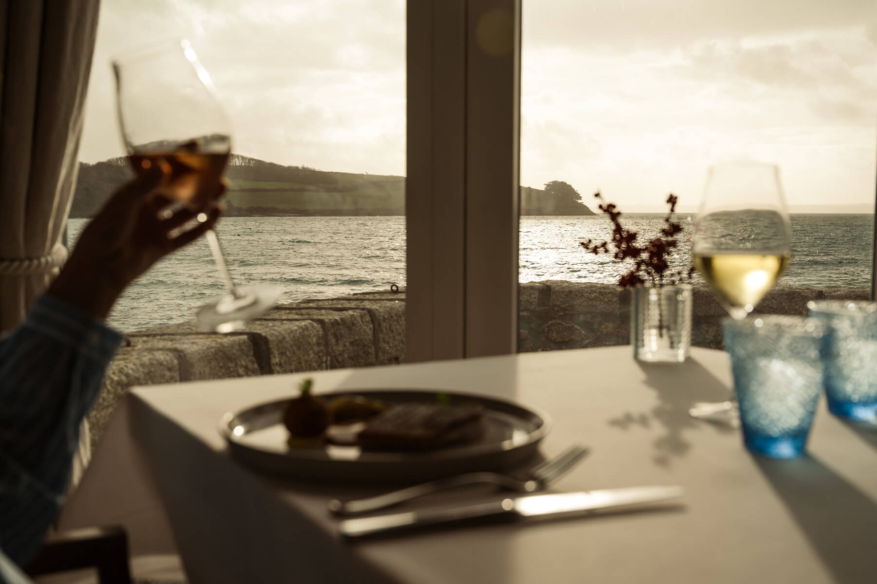 Table set for dinner overlooking St Mawes harbour