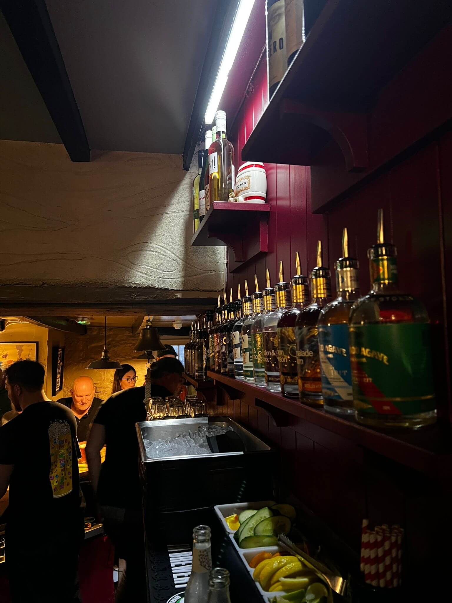 Staff behind the bar inside the Red Lion in Newlyn