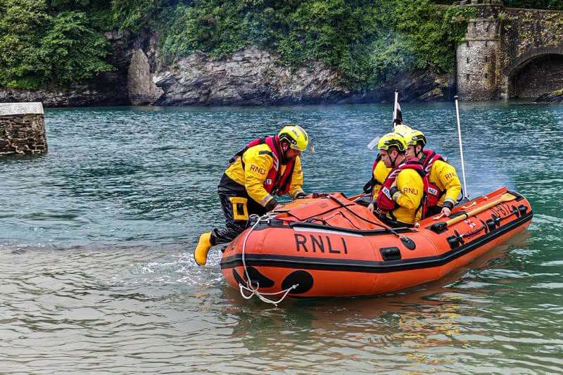 RNLI crew preparing to launch the D Class inshore lifeboat Ollie Naismith II