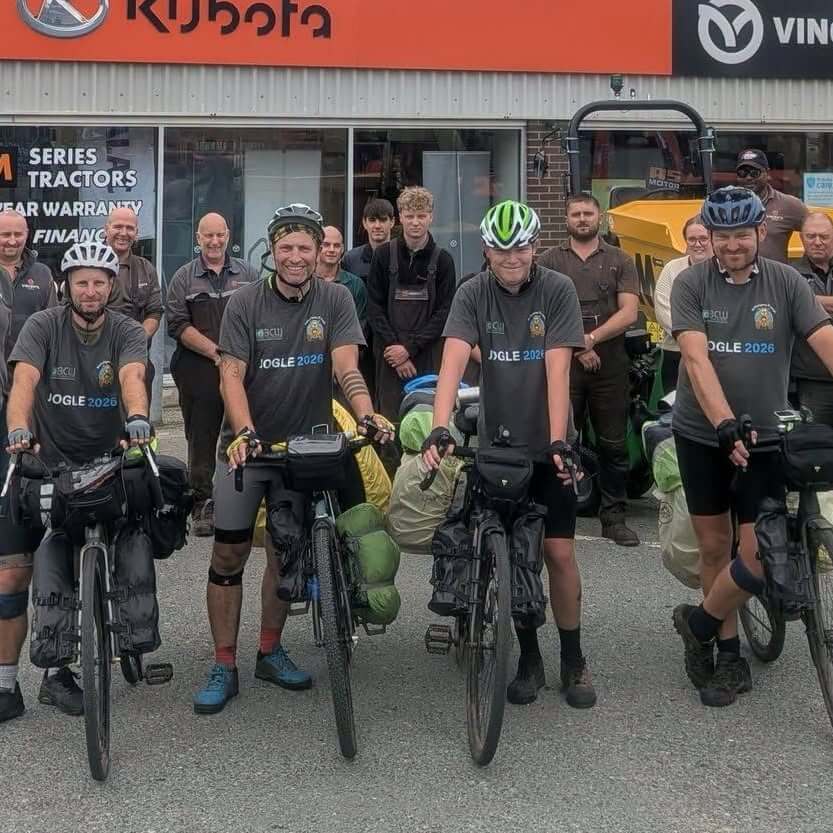 The four riders with supporters and sponsors at the start of the ride