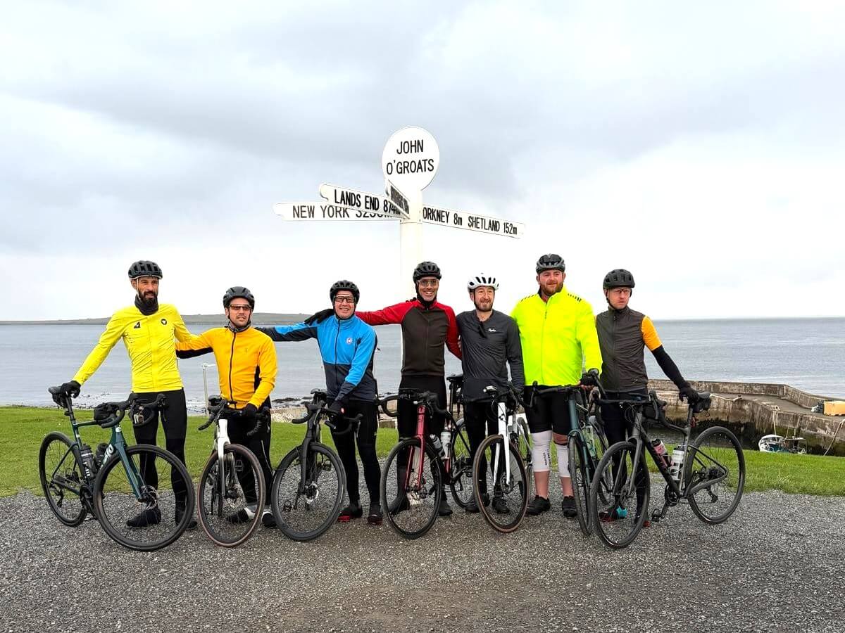The Cycle for Michael riders at the John O'Groats signpost