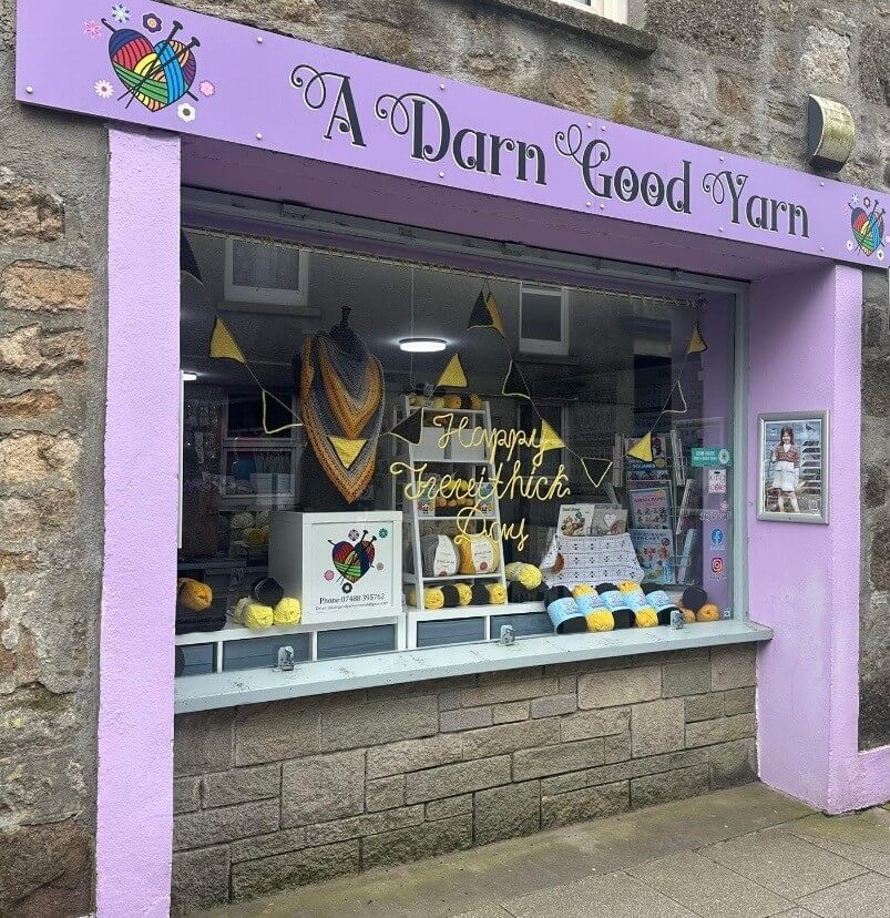 The purple shopfront of A Darn Good Yarn on Cross Street, Camborne