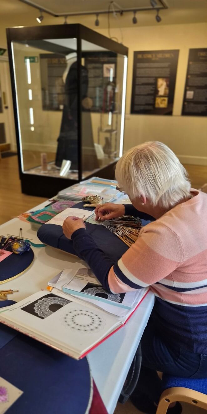 Christina Whitty demonstrating lace making
