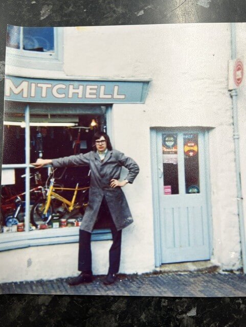 Clive Mitchell outside the original Clive Mitchell Cycles shop in 1970