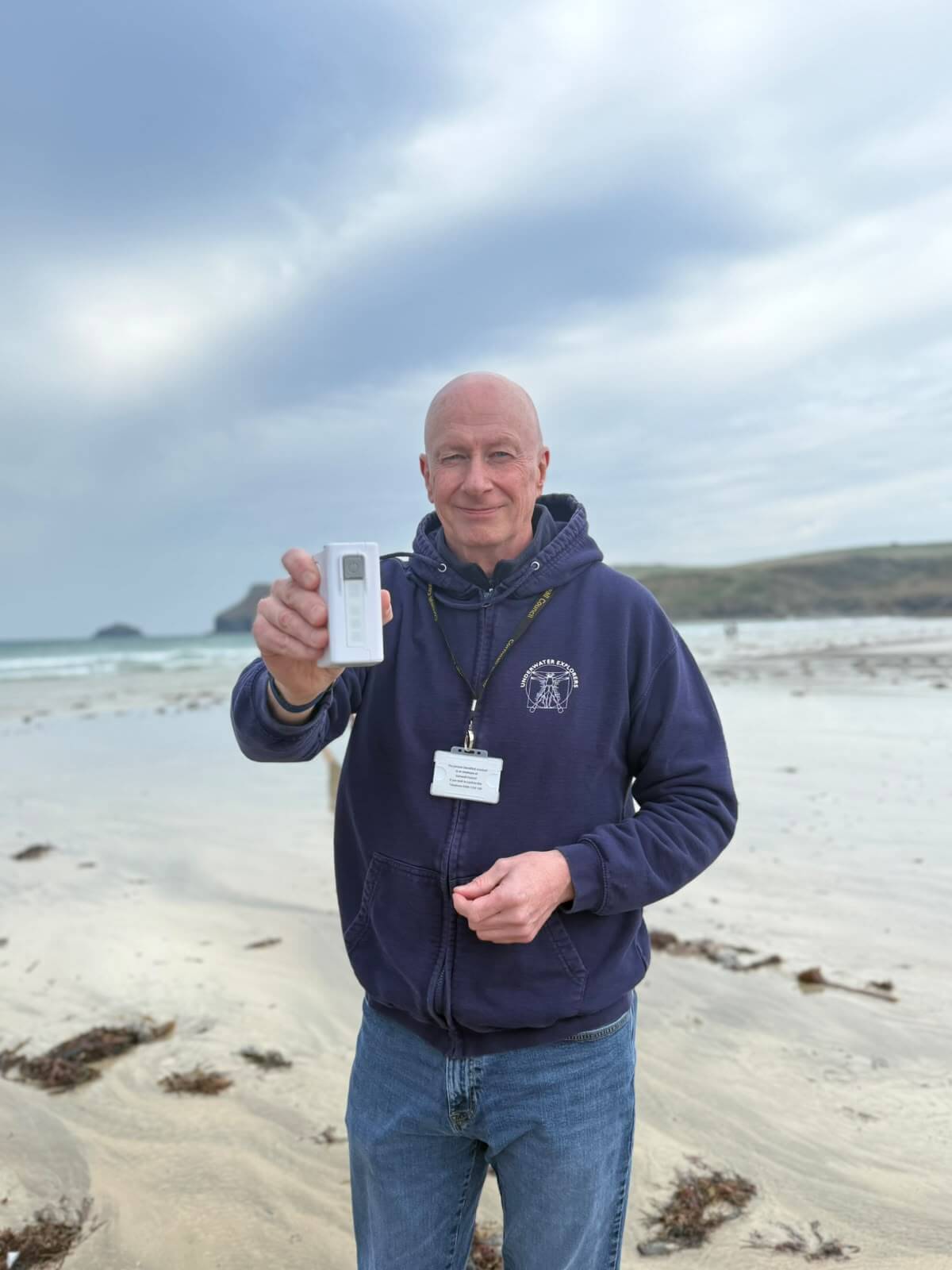 Cllr David Garrigan holding a water testing kit