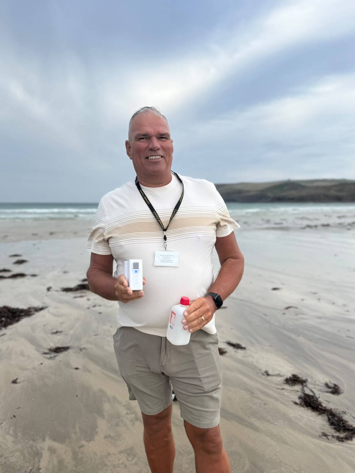 Cllr James O'Keefe holding a water testing kit