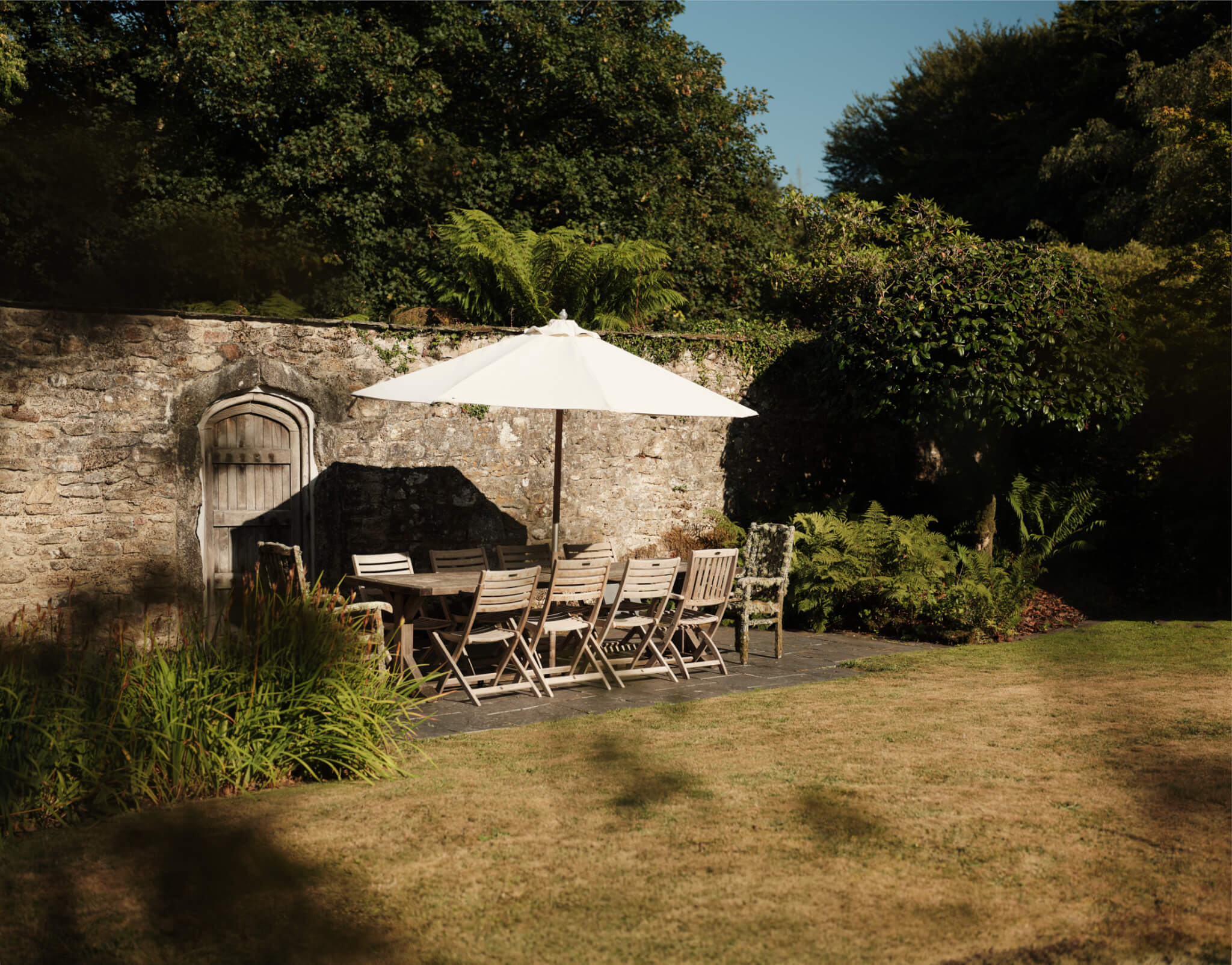 Outdoor dining table in Hamatethy's walled garden