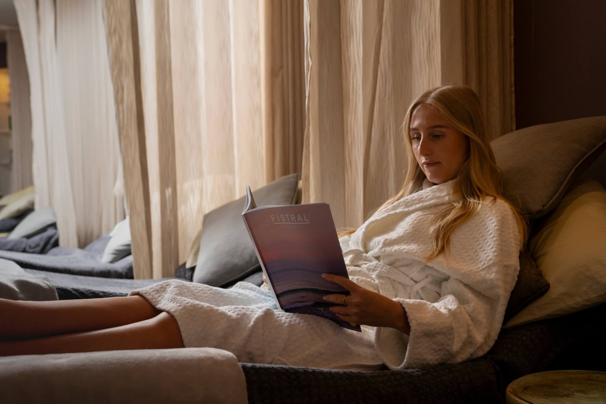 Guest reading in the Fistral Spa relaxation room