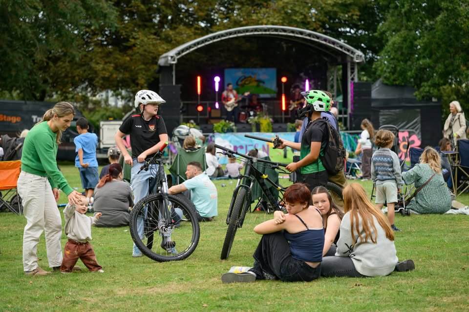 Cyclists and families near the stage at Camborne Green Fest
