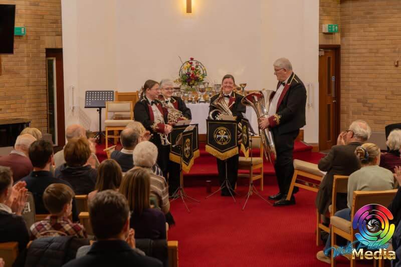 Brass musicians performing at the Saltash Music, Speech and Drama Festival