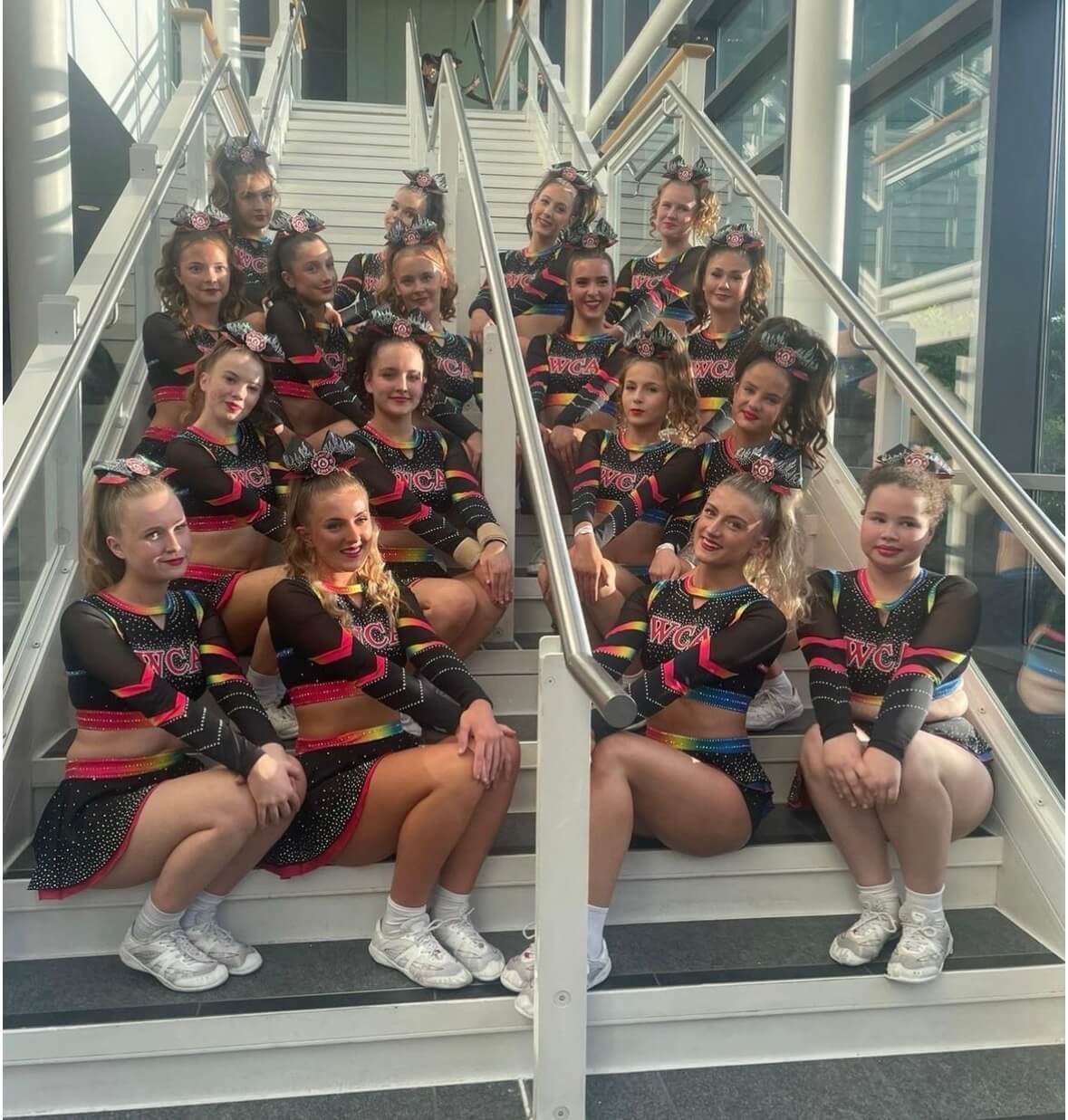 West Coast Academy's cheerleading squad in competition uniform