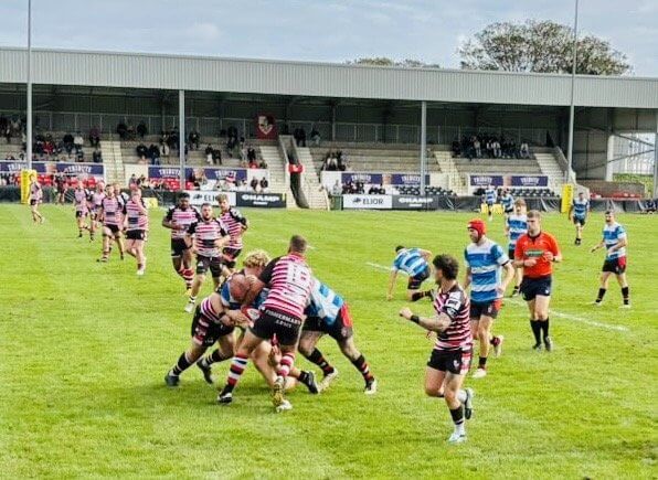 Penzance & Newlyn v Teignmouth match action at the Mennaye Field, with the new stand behind