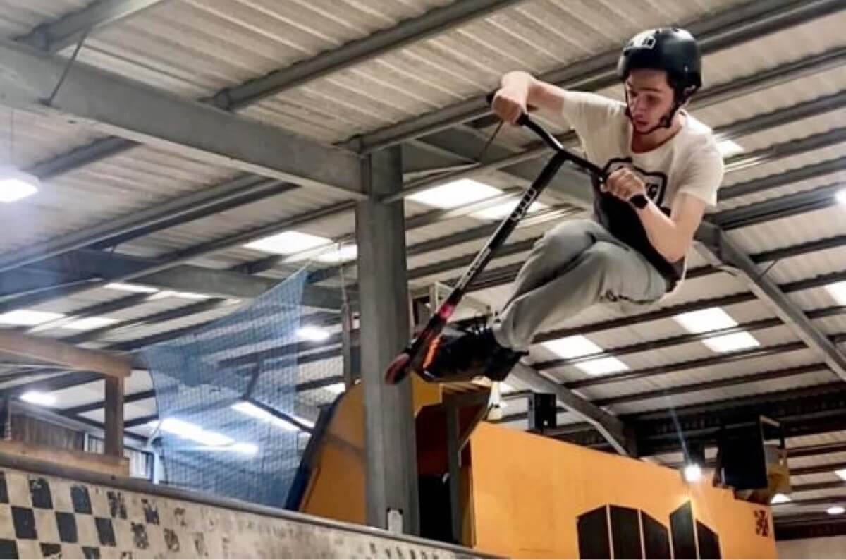 A skate park rider mid-air at Mount Hawke Youth and Community Group in Cornwall