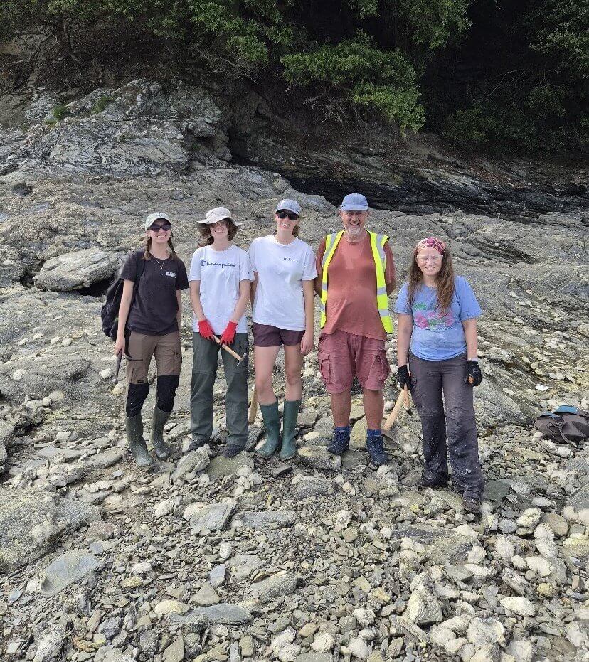 Nadine Milner with Falmouth Marine Conservation volunteers on a rocky shore