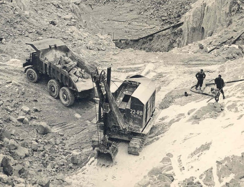 Archive photograph of a steam shovel loading a truck in a china clay pit