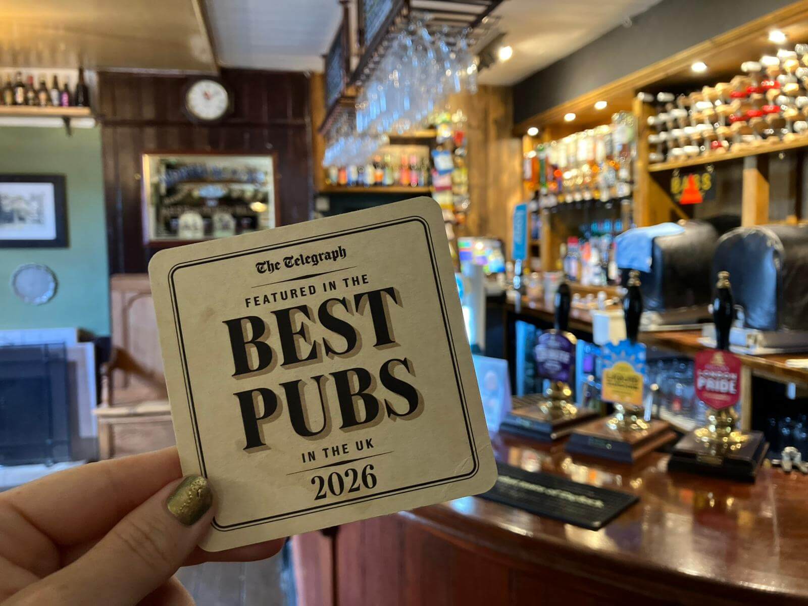 A New Inn coaster marking The Telegraph's Best Pubs 2026 list