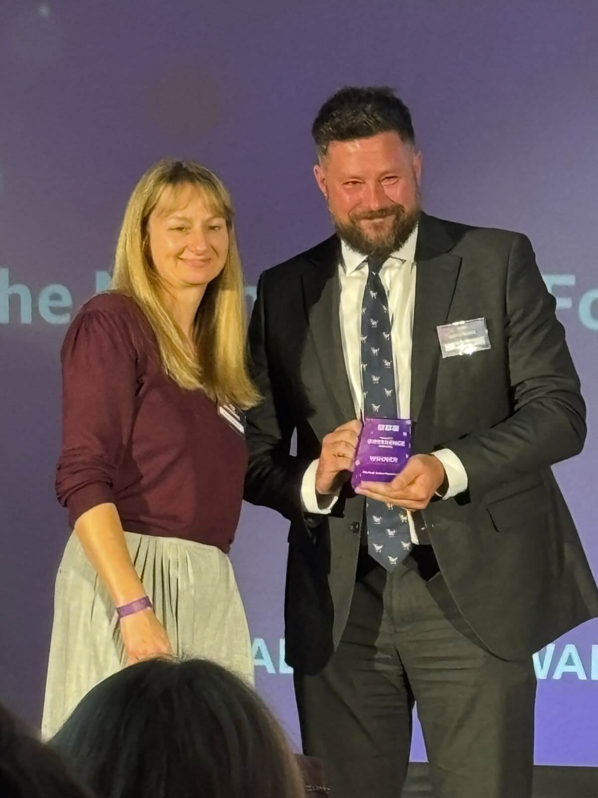Ben Jordan collecting his BBC Make a Difference Award on stage