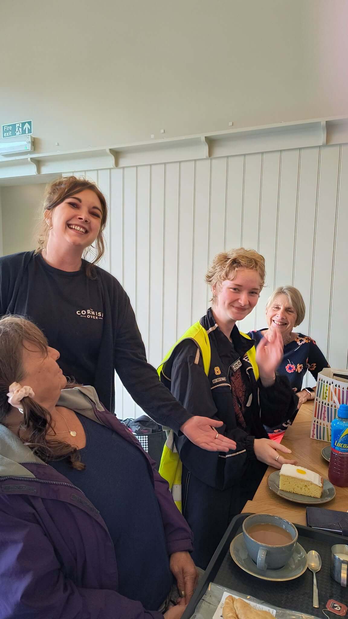 Ash celebrating her birthday with fellow Bodmin Tidy it Team volunteers and a cake from The Cornish Oven