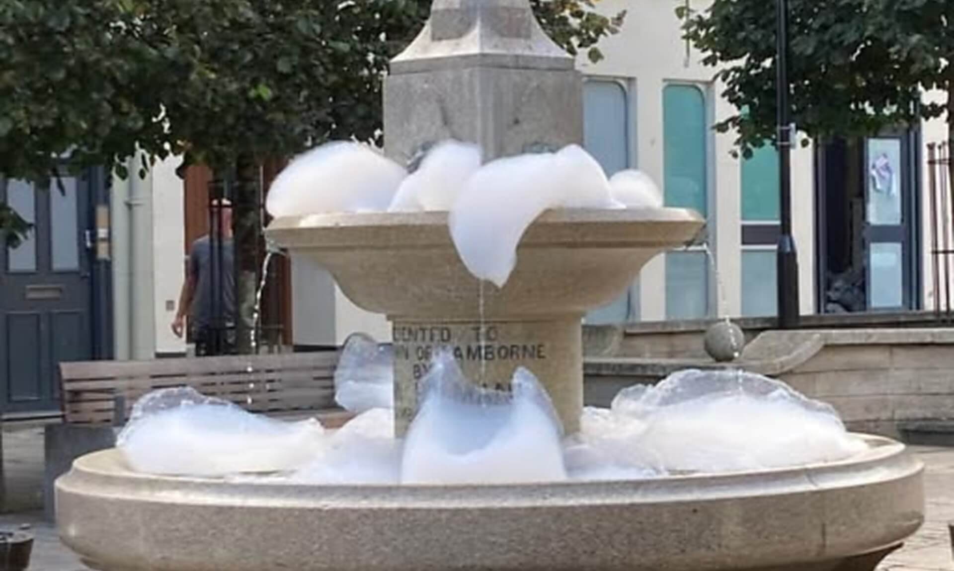 Camborne town centre fountain filled with foam