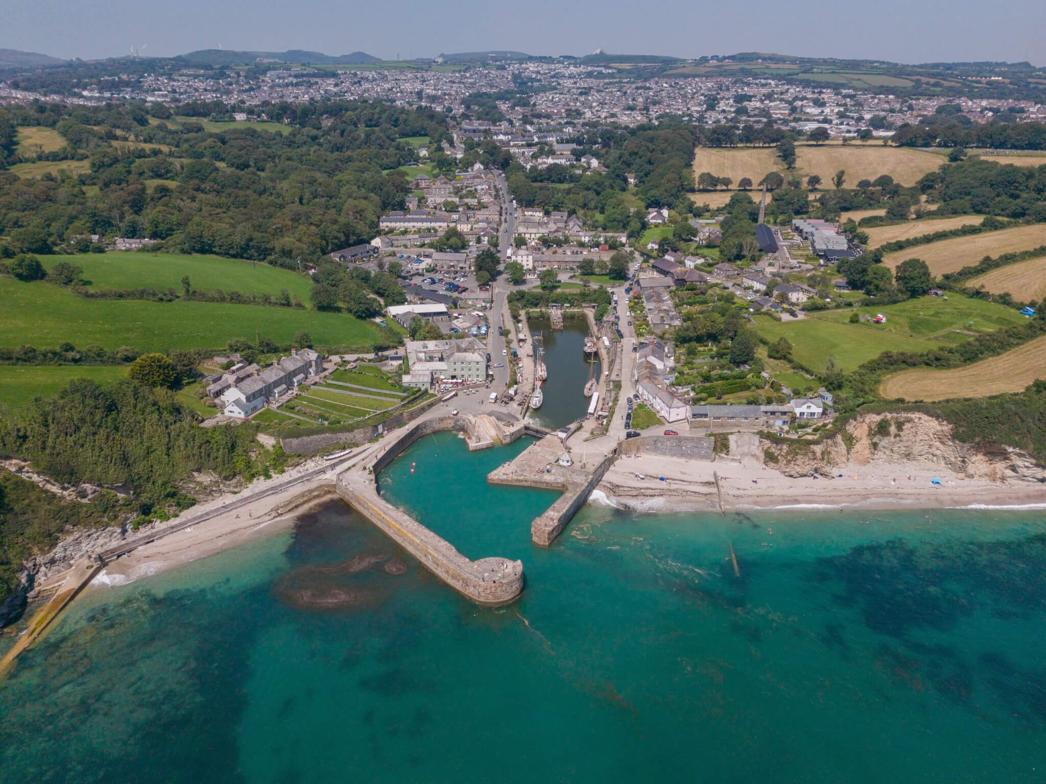 Aerial view of Charlestown Harbour and village looking inland towards St Austell