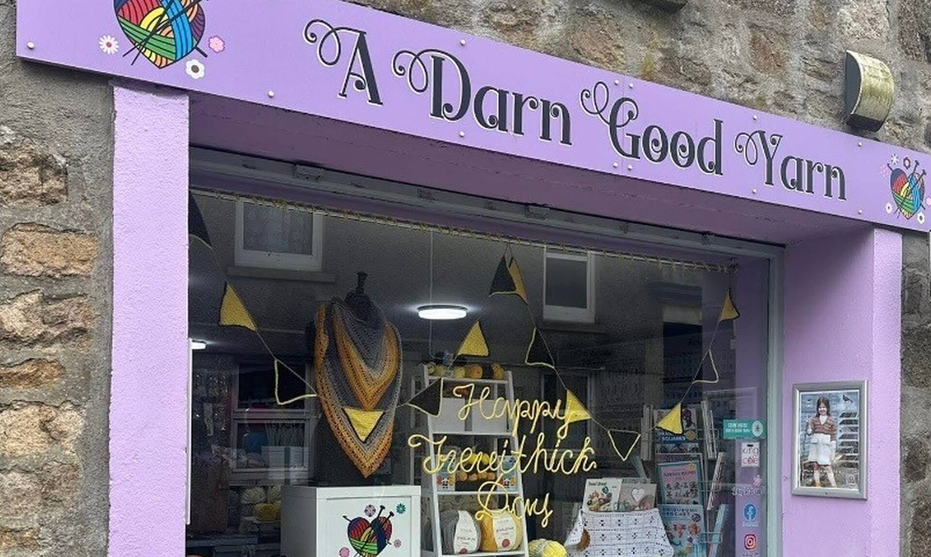 The purple shopfront of A Darn Good Yarn on Cross Street, Camborne