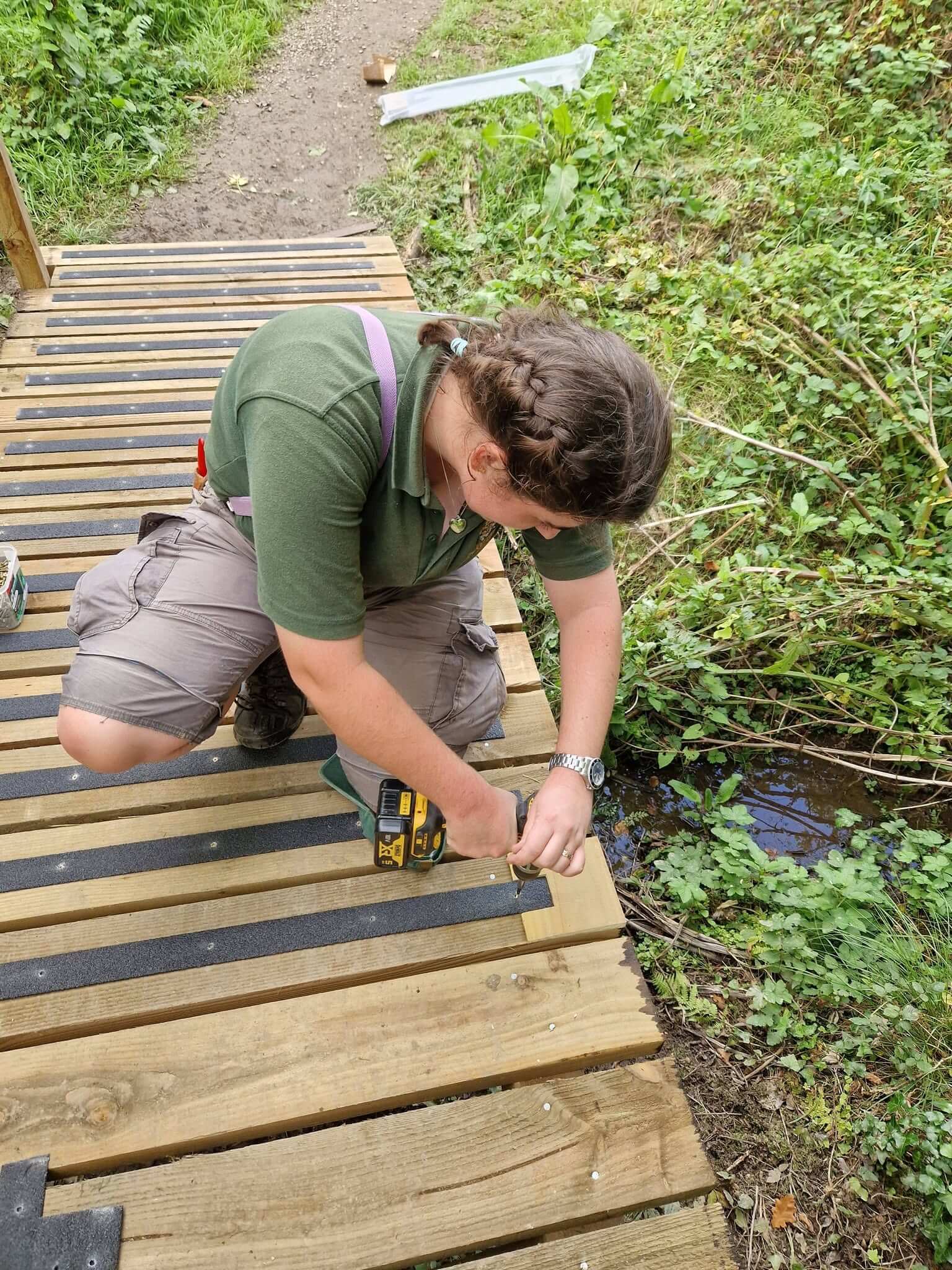 Grip strips being fixed to the new boardwalk