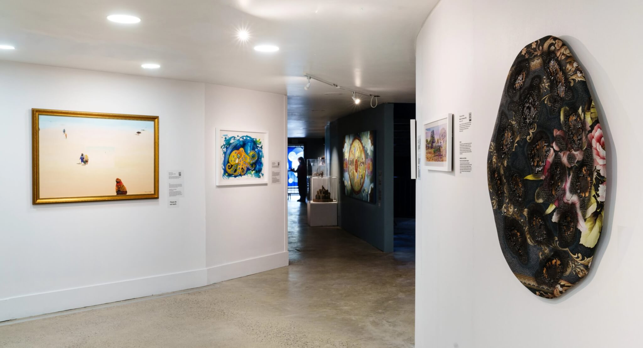 Gallery view of paintings, ceramics and sculpture inside Extinction: Renewal at Eden Project