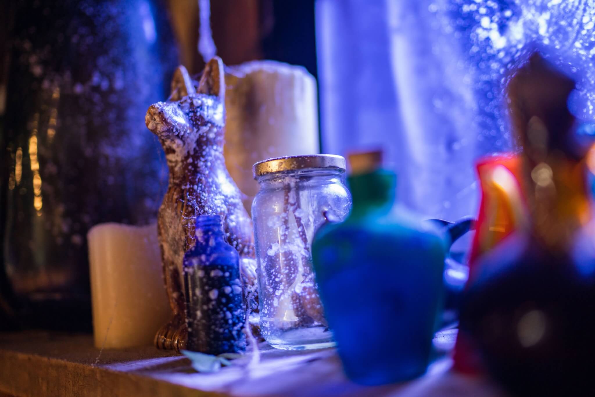 Glowing potion bottles decoration at Eden Project Halloweden