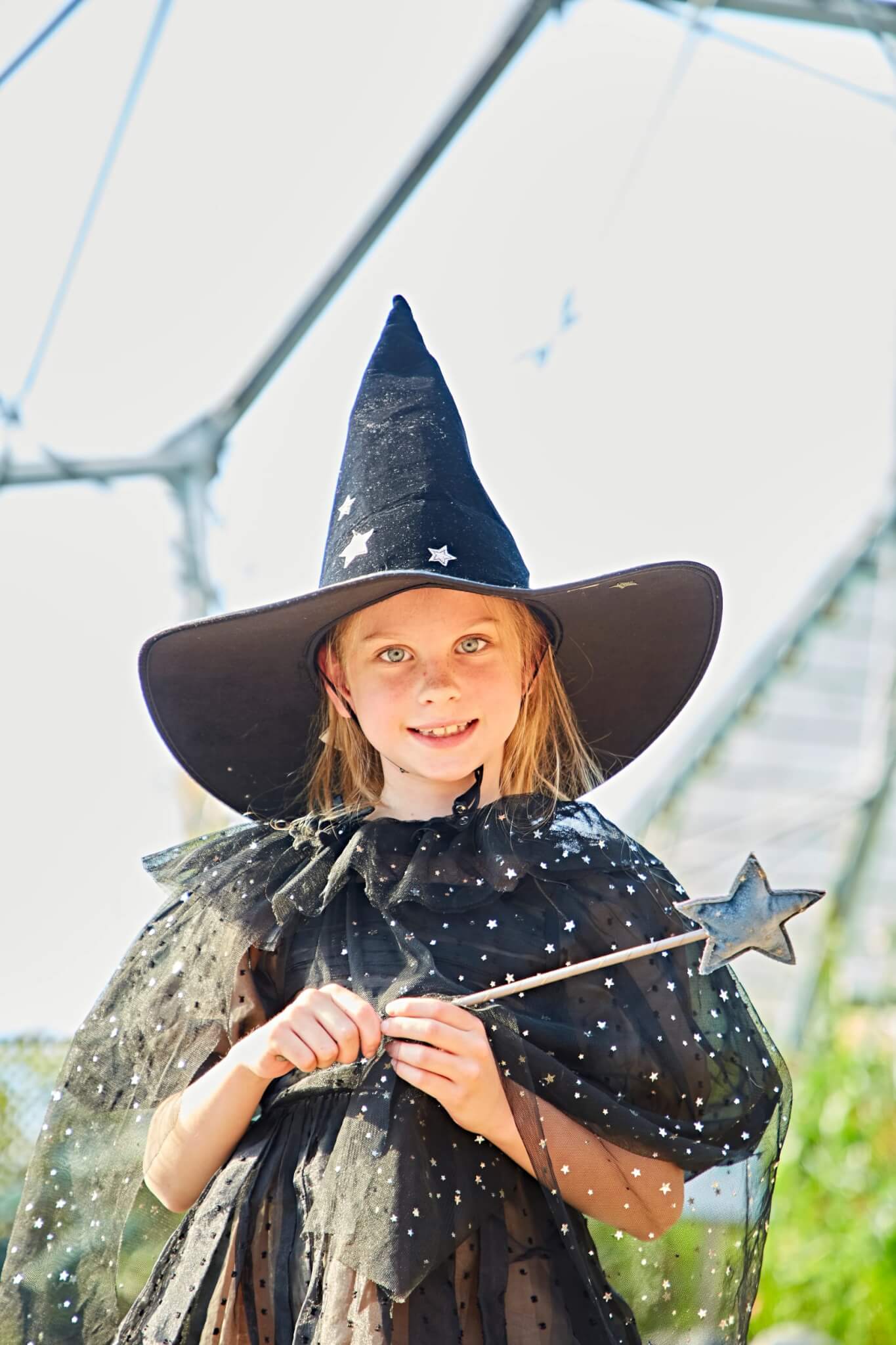 Girl dressed as a witch at Eden Project Halloweden