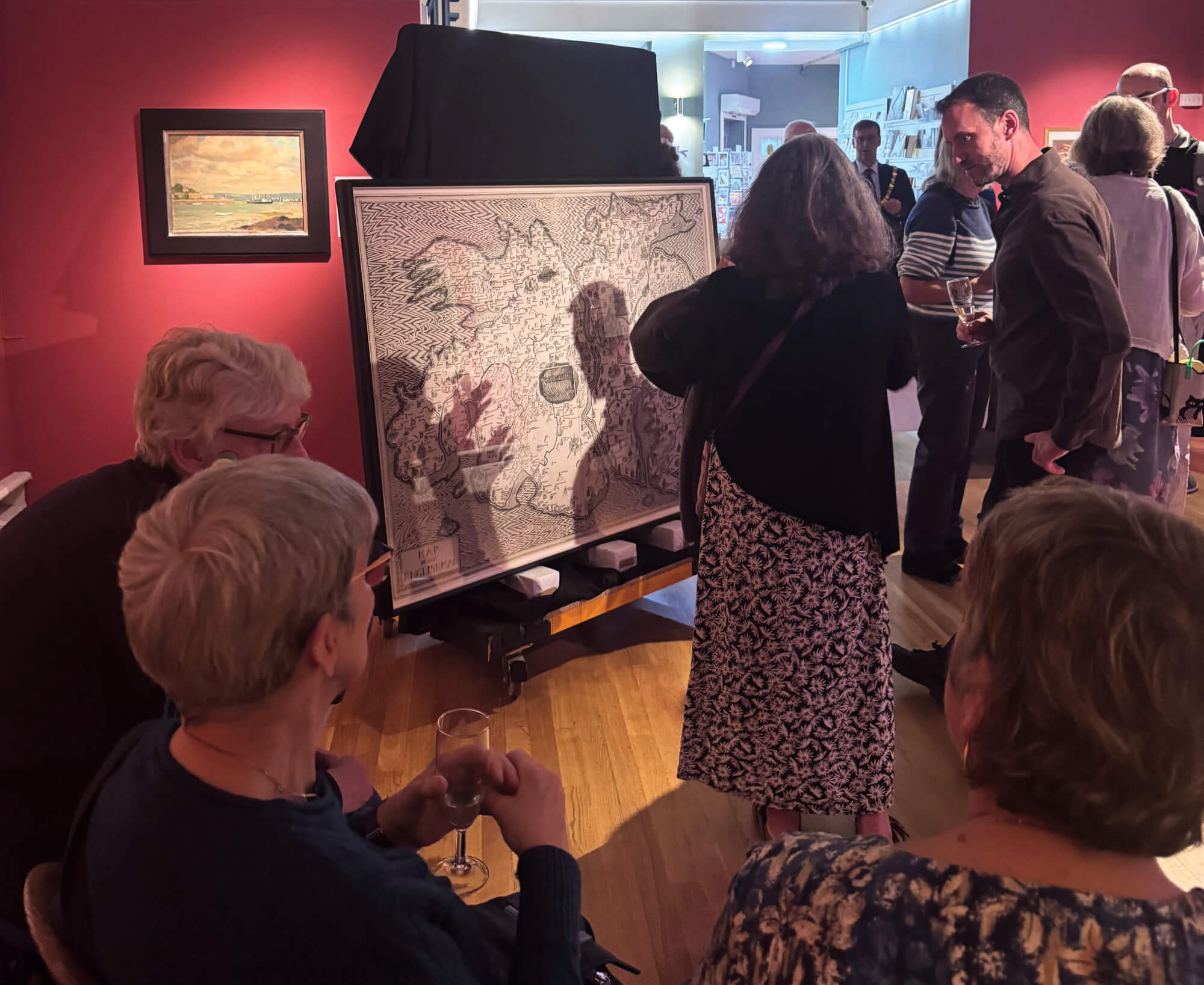 Guests viewing Map of an Englishman at Falmouth Art Gallery's private view
