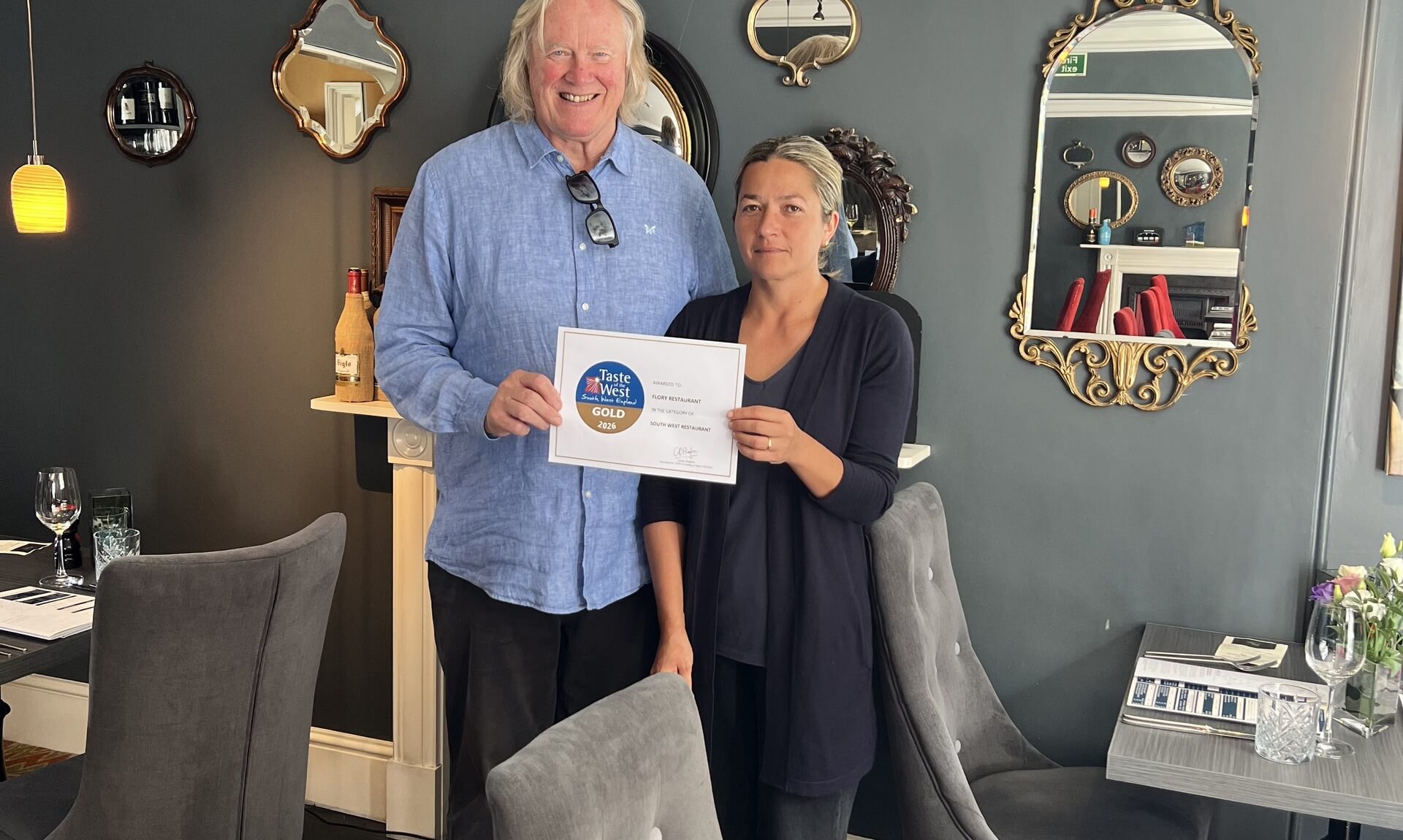 Ray and Flory Veerman holding Flory Restaurant's 2026 Taste of the West Gold Award