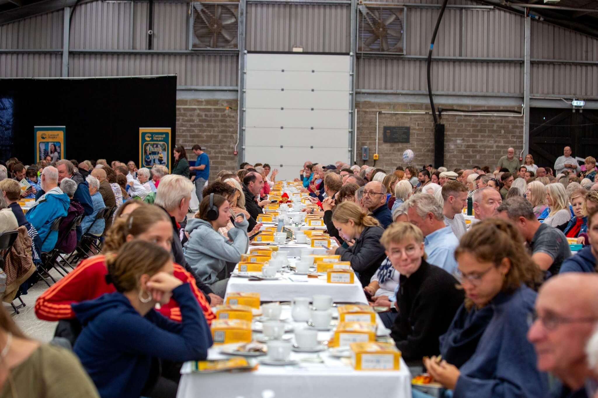 Rows of supporters at the record-breaking cream tea party at the Royal Cornwall Showground