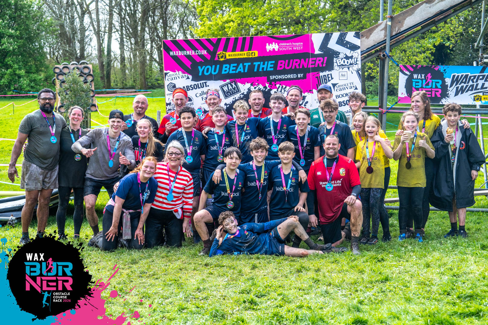 Group of WAX Burner finishers with medals at Trewan Hall near Newquay