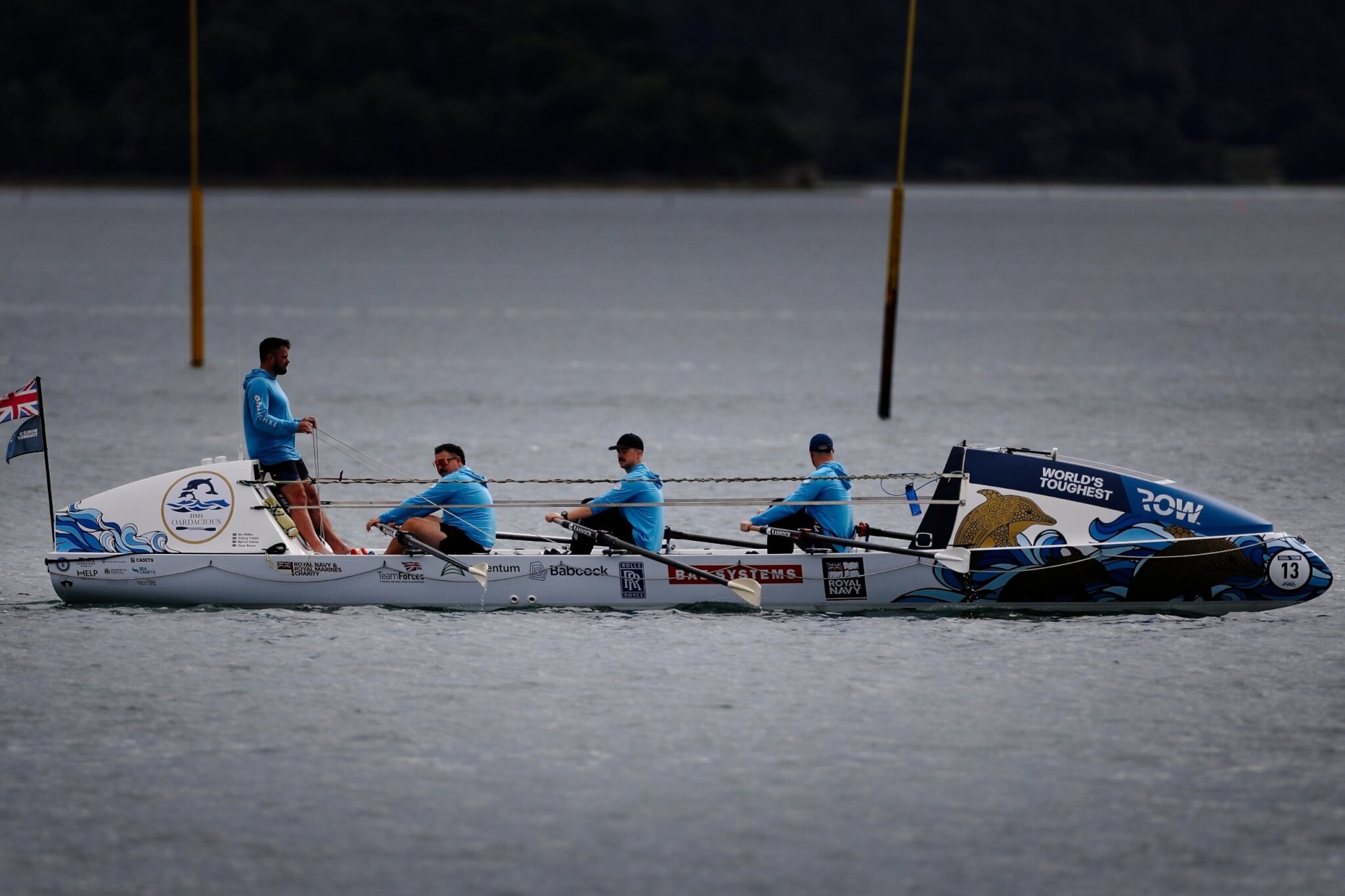 The HMS Oardacious boat under oars