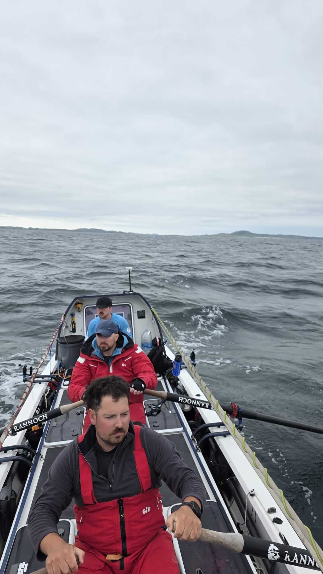 HMS Oardacious crew rowing in open water