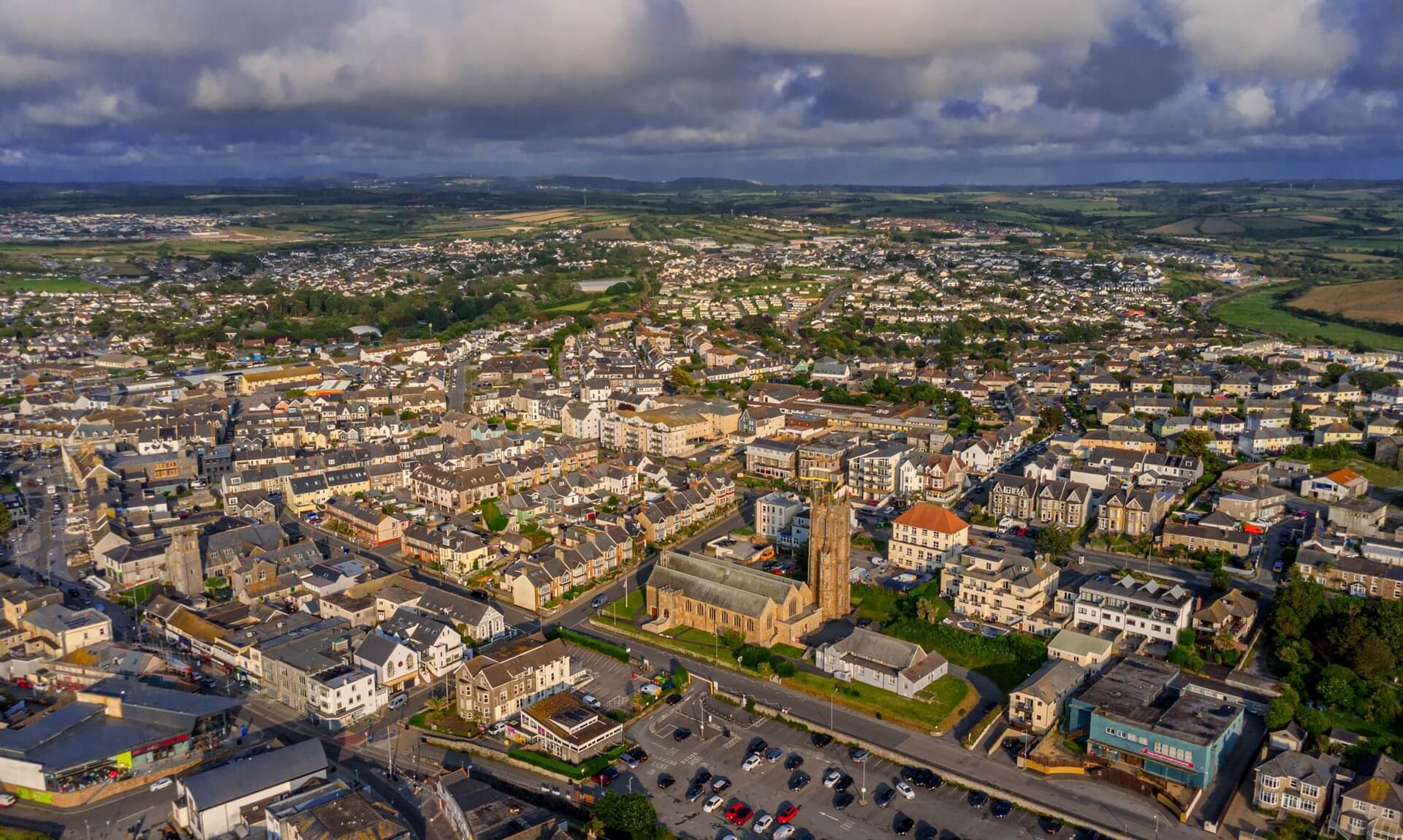 Aerial view of a Cornish town showing rows of houses