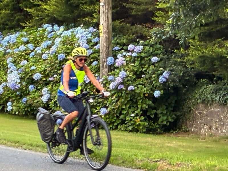 Liz Dando cycling as part of her eight-challenge octathlon