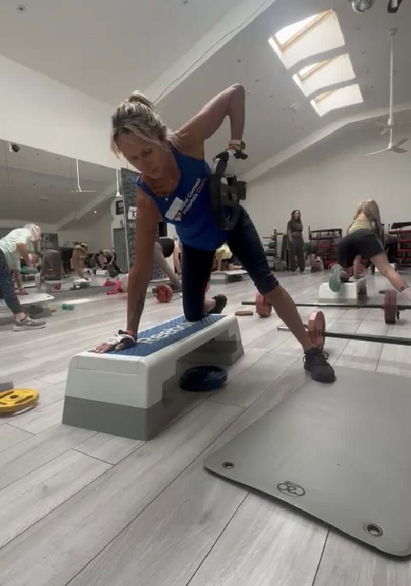 Liz Dando taking part in a fitness class during her octathlon