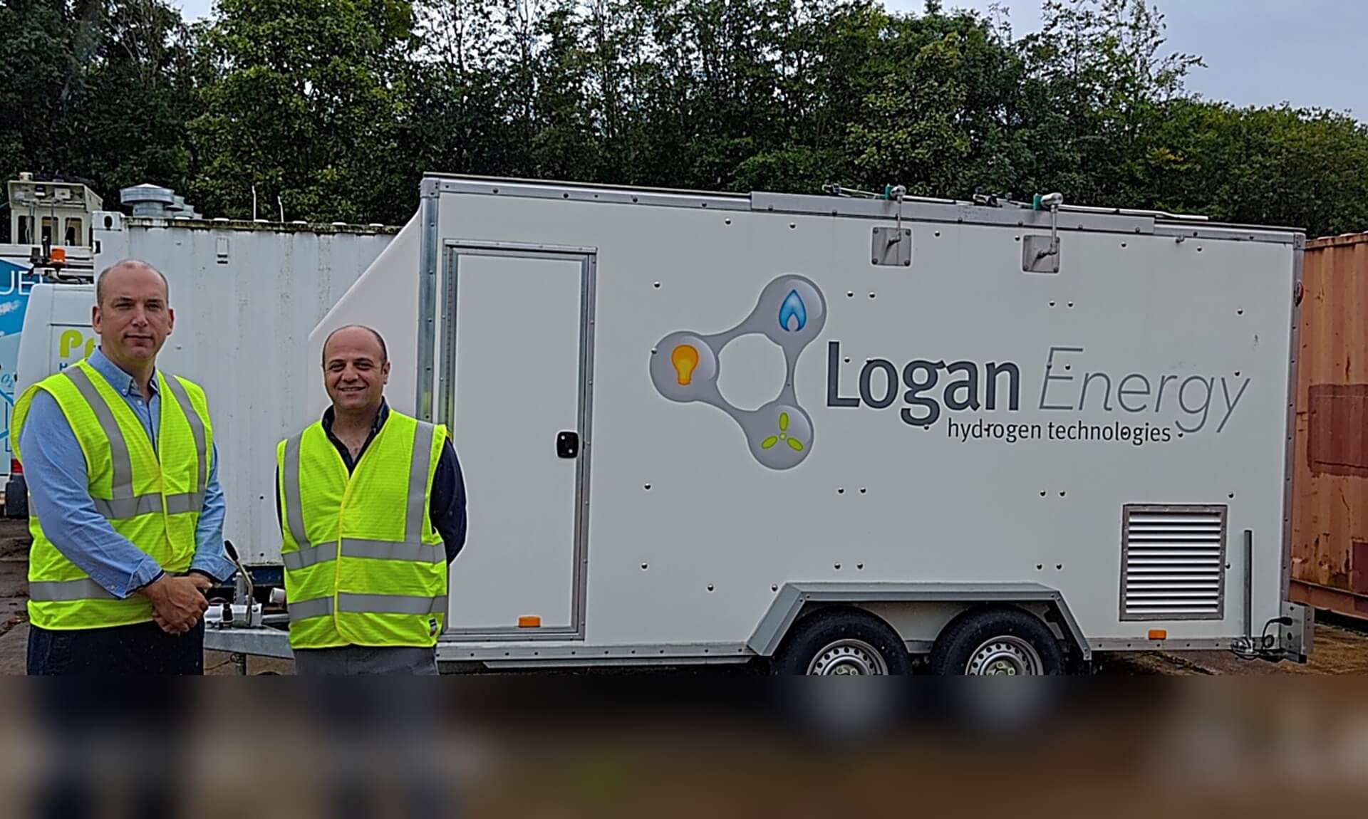 Louis Gardner and Ahmad El-kharouf beside a Logan Energy hydrogen trailer