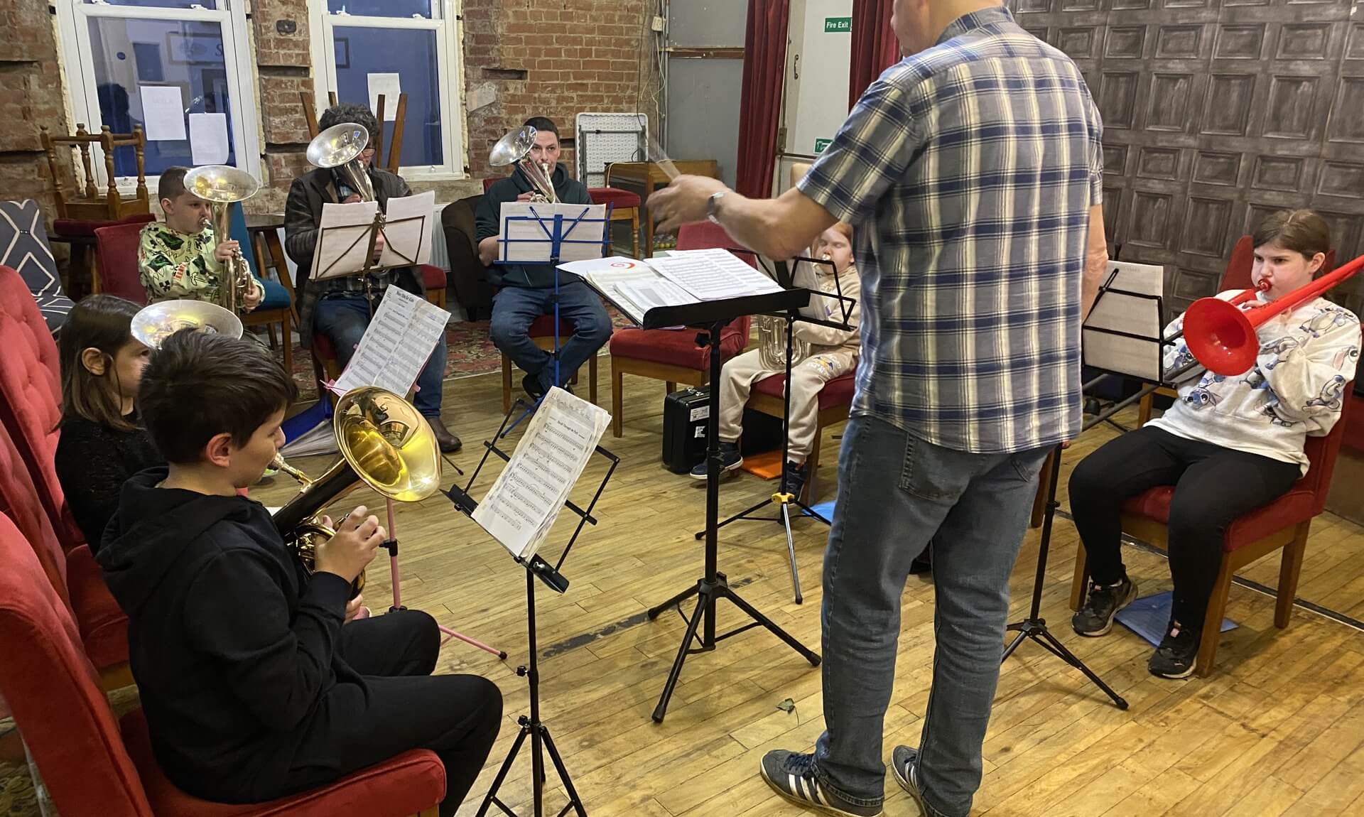 Young brass players rehearsing with Lostwithiel Town Band