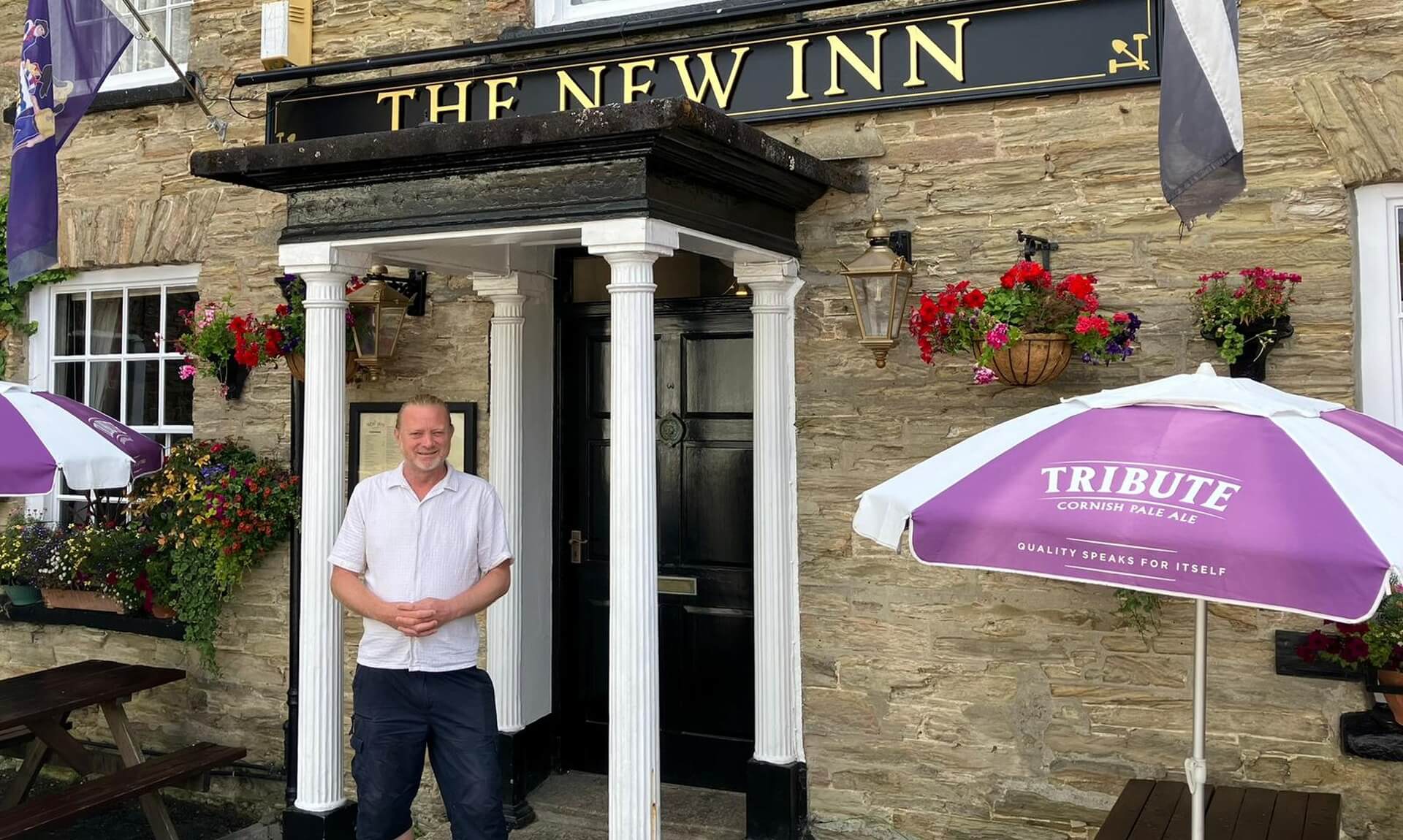 The New Inn pub sign and entrance in Tywardreath