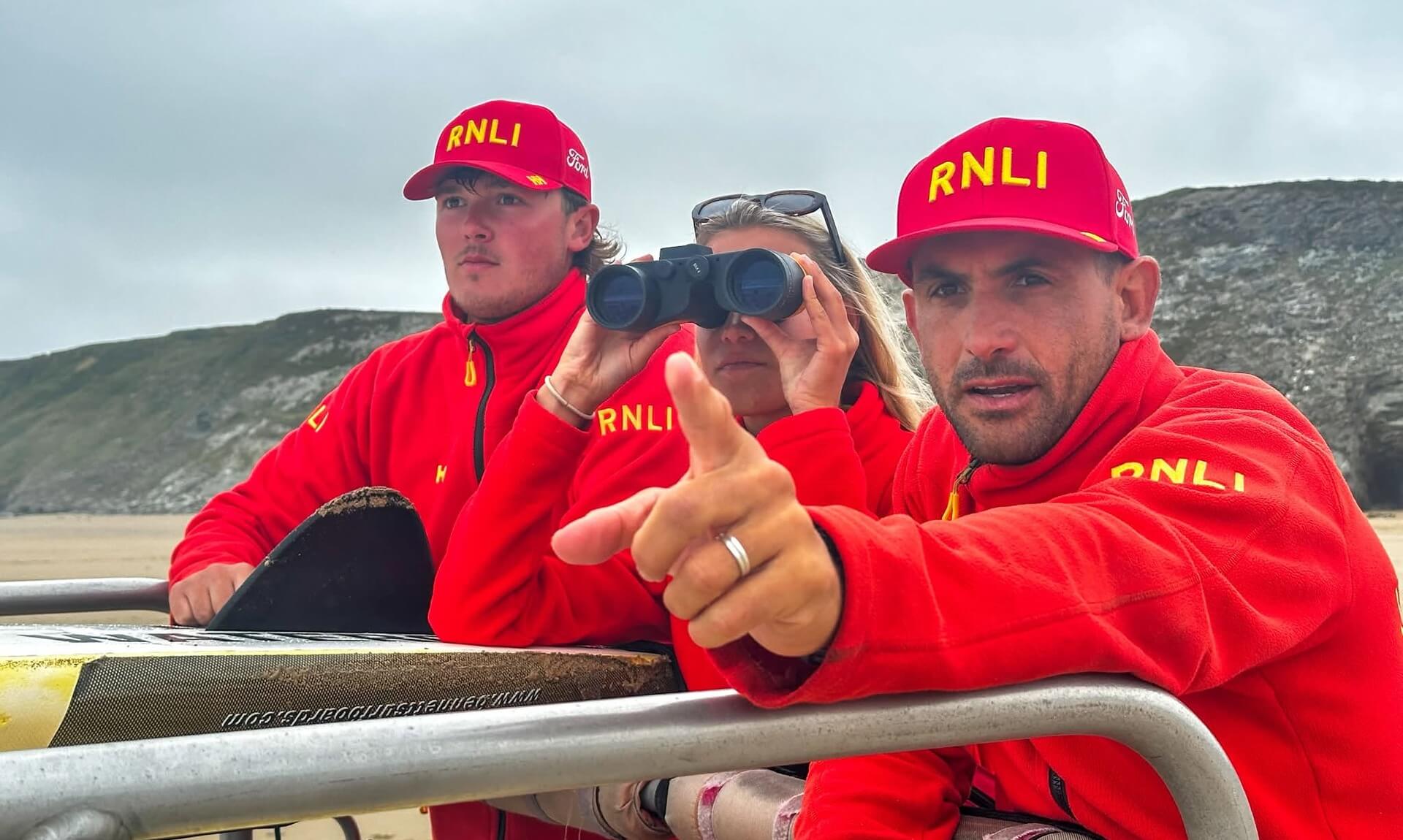 RNLI lifeguards Olly Malkin and Agus Lanzavecchia on duty at Watergate Bay near Newquay