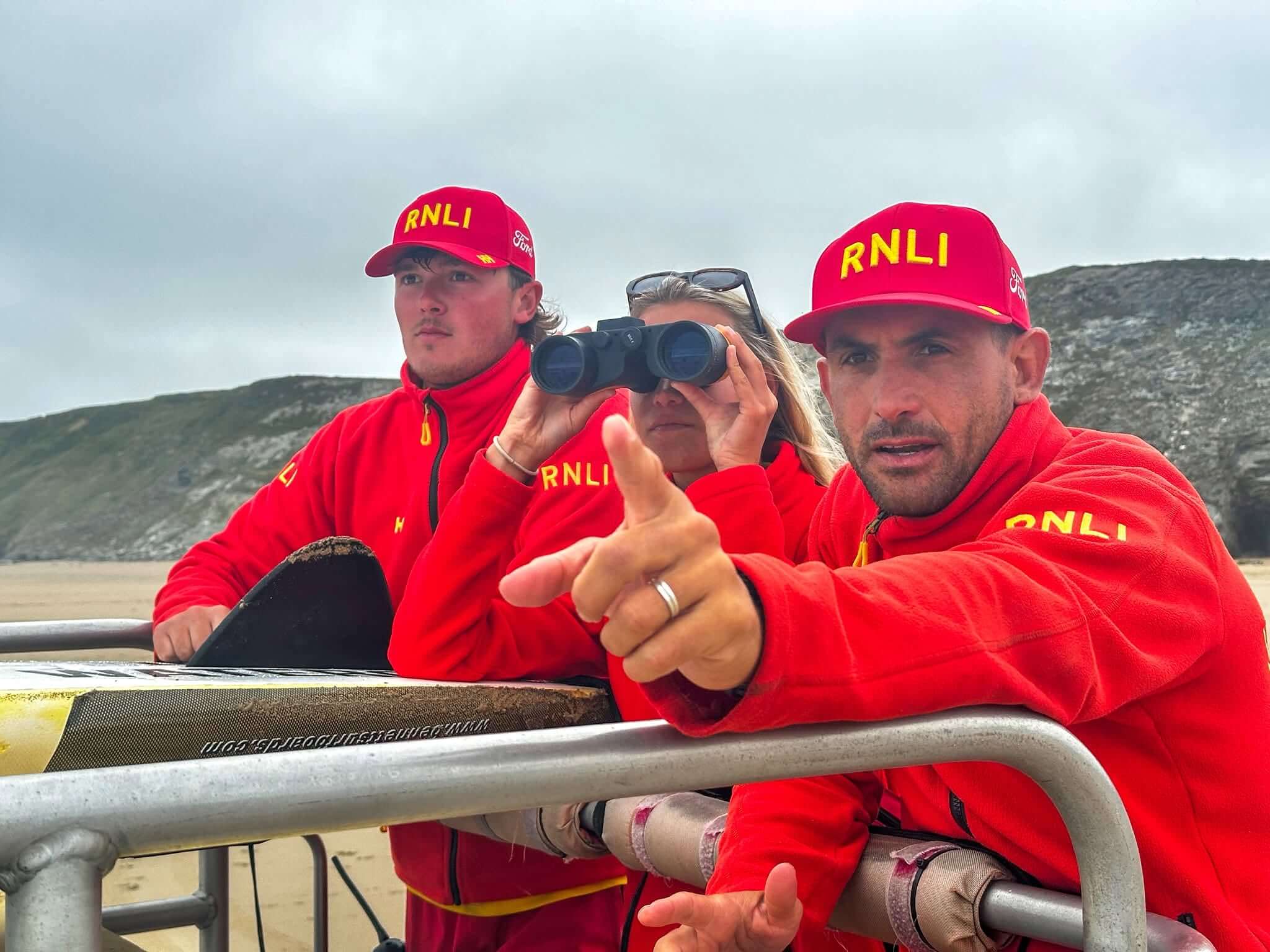 RNLI lifeguards Olly Malkin and Agus Lanzavecchia on duty at Watergate Bay near Newquay