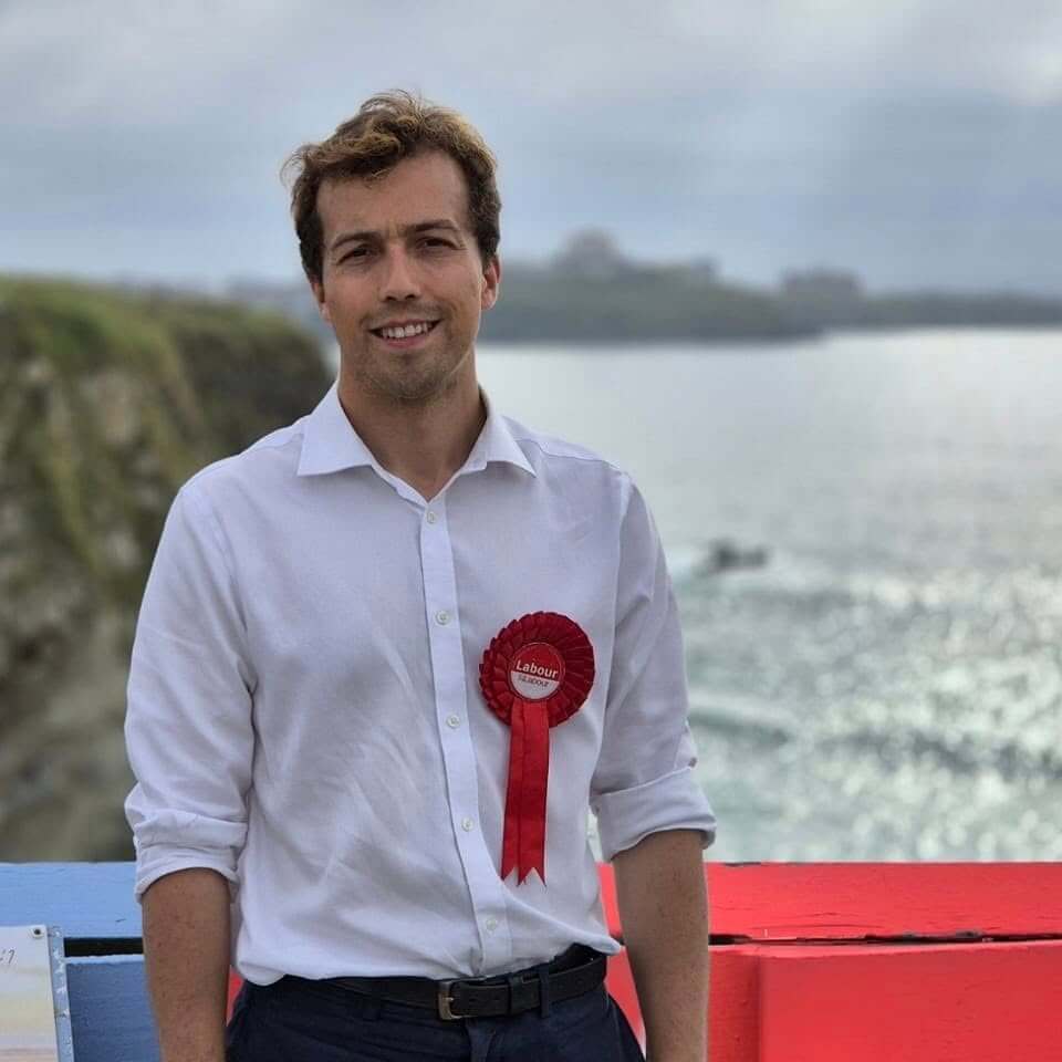 Noah Law, MP for St Austell and Newquay, wearing a Labour rosette