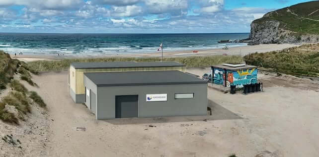 CGI render of Porthtowan Surf Life Saving Club's new building with the beach and sea behind