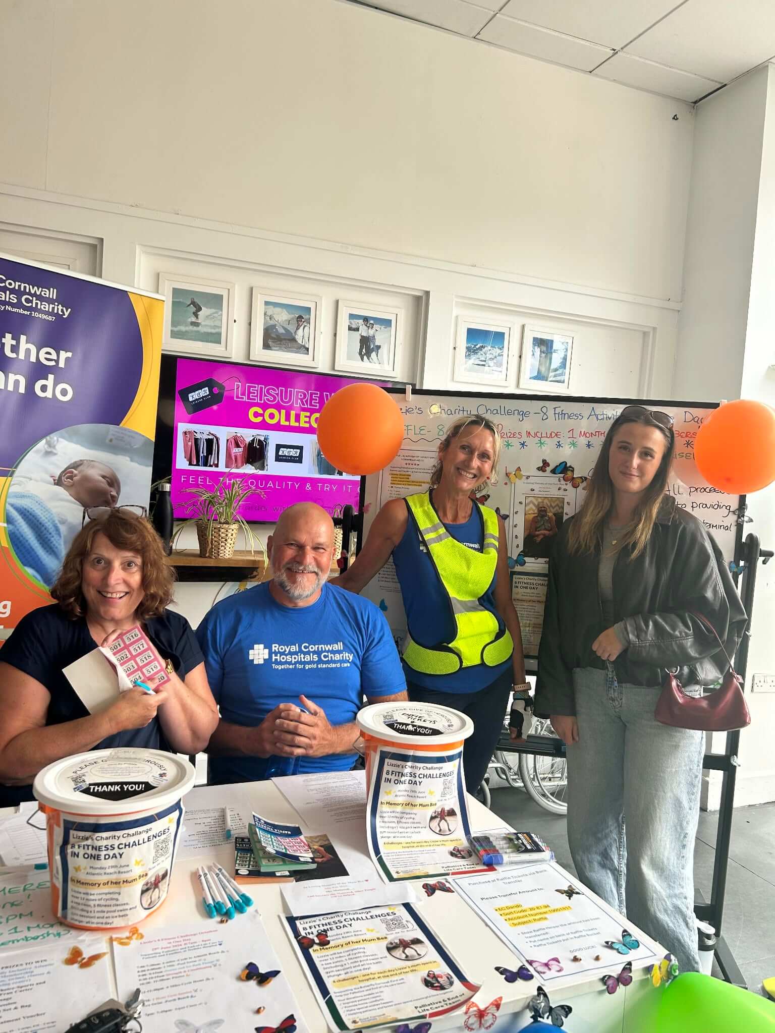 Volunteers at the Royal Cornwall Hospitals Charity raffle stall for Liz Dando's octathlon