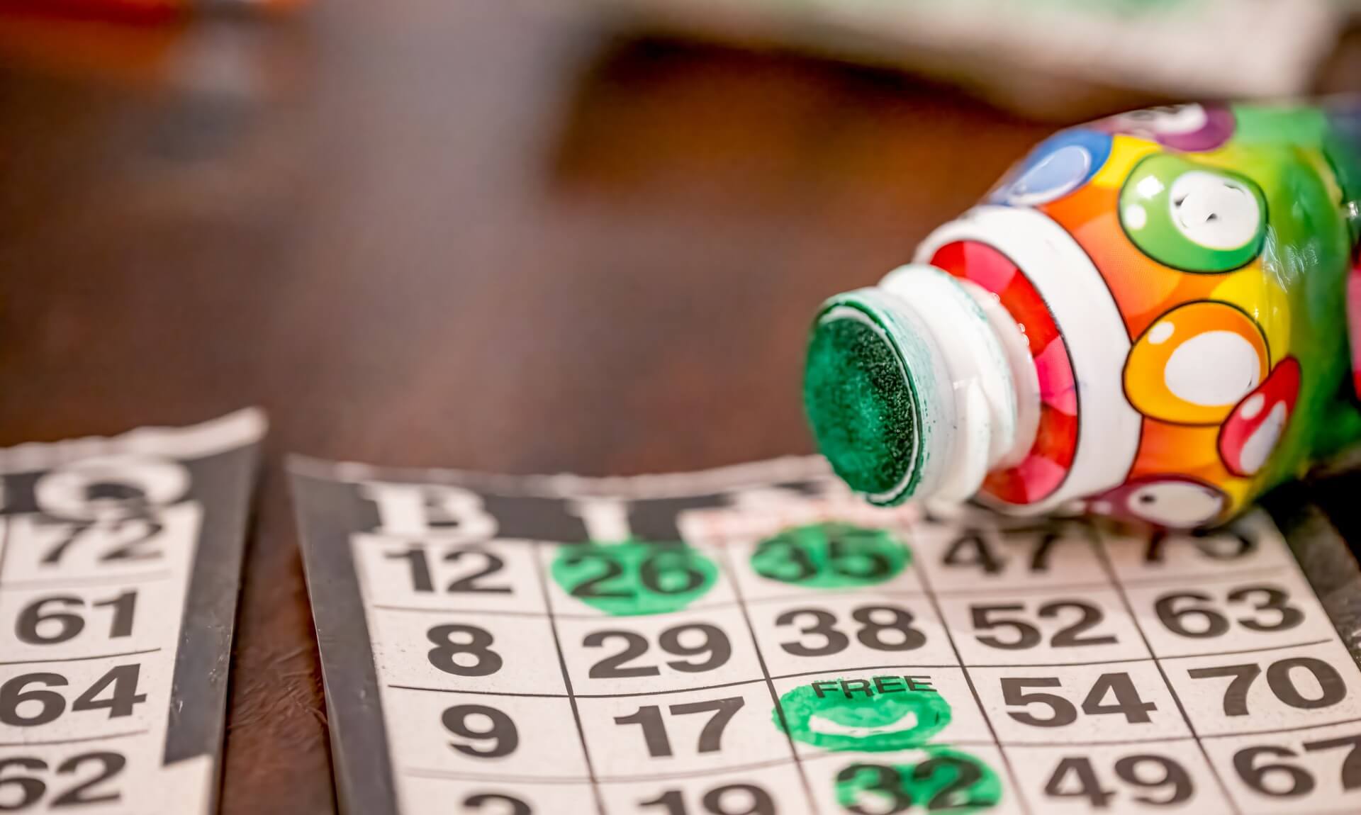 Bingo cards and a dauber pen at a prize bingo evening
