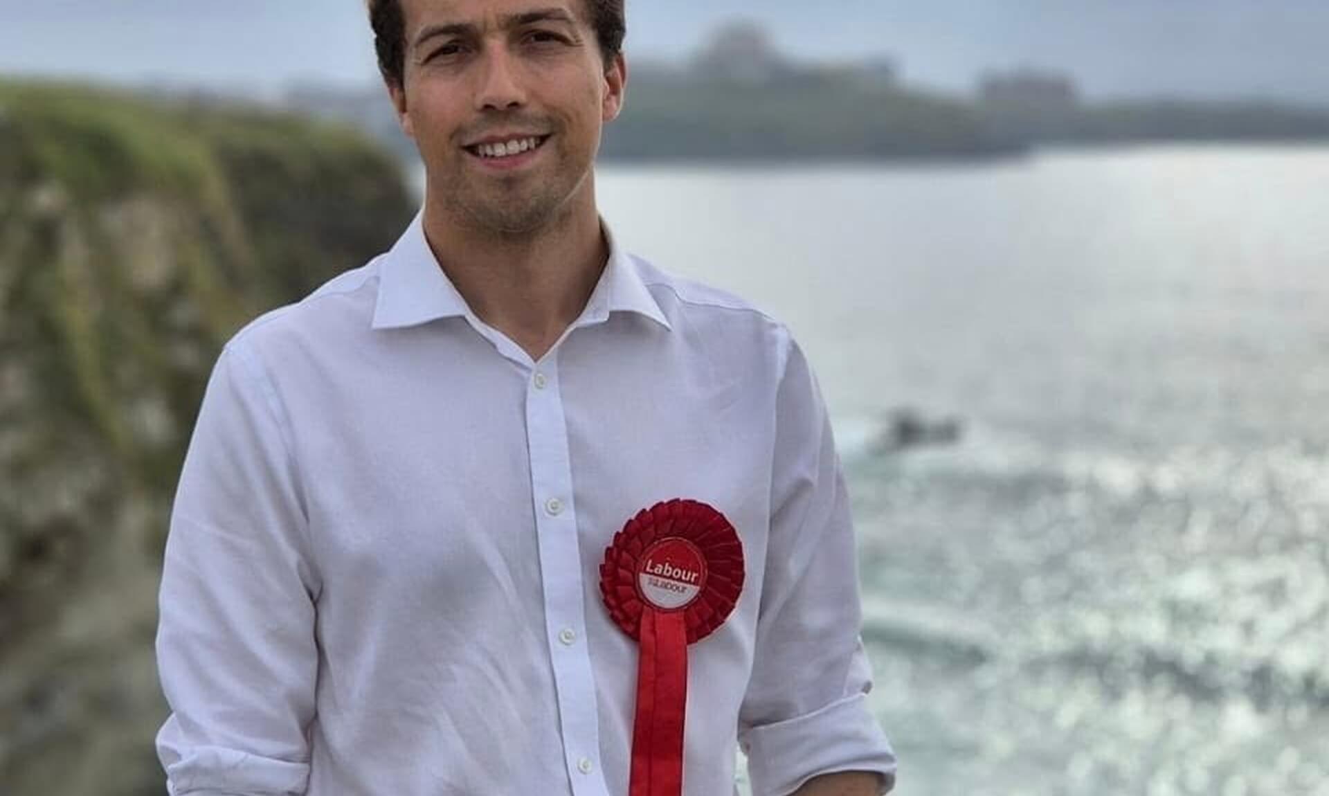 Noah Law, MP for St Austell and Newquay, wearing a Labour rosette
