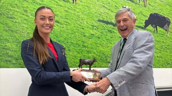 Holly being presented with her West Country Dairy Award trophy